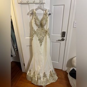 White/gold evening gown with  peachy\nude train